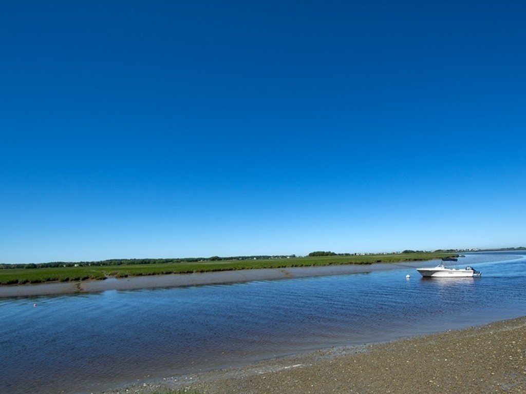 60 Powder Point Avenue Duxbury, MA 02332 - Photo 2 of 30 a view of ocean and sunset