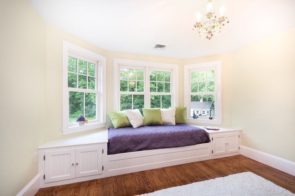 60 Powder Point Avenue Duxbury, MA 02332 - Photo 26 of 30 a living room with furniture and a window