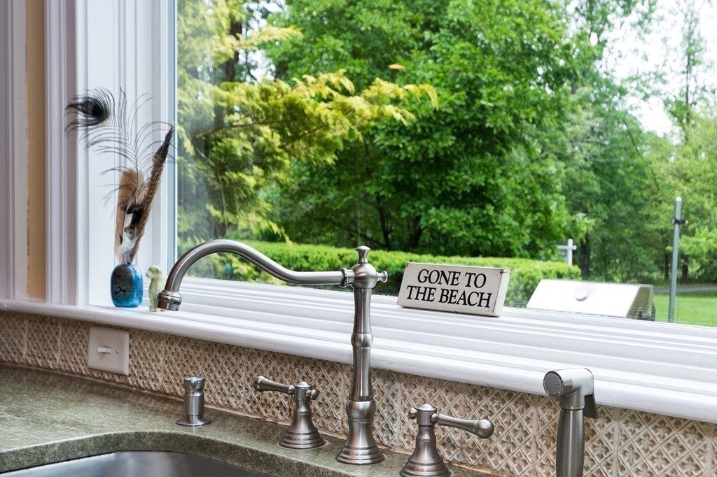 60 Powder Point Avenue Duxbury, MA 02332 - Photo 29 of 30 a view of a street with an outdoor seating