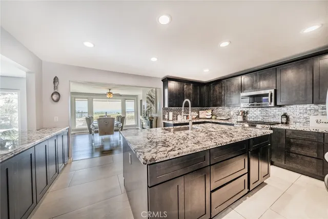 a spacious bedroom with a bed and window