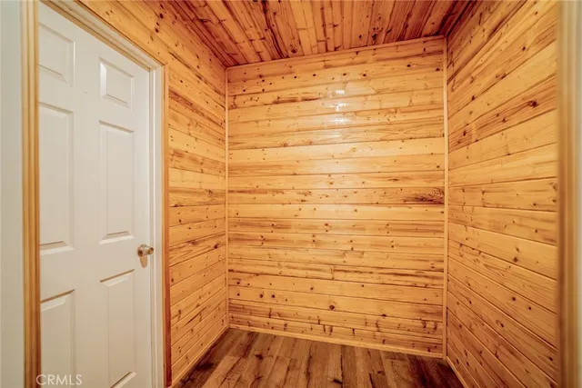 a bathroom with a shower and a sink