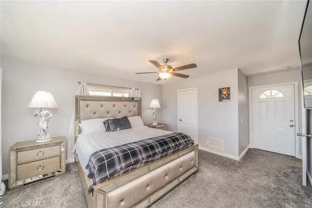 a bathroom with a glass shower door
