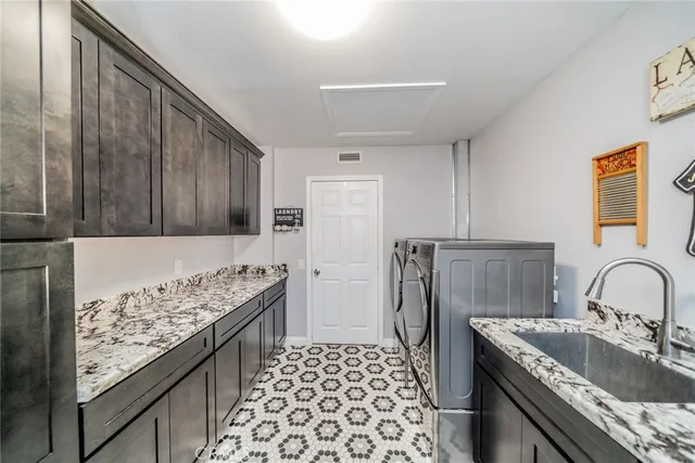 a view of a house with potted plants