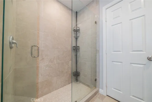 a view of a house with a snow on the road