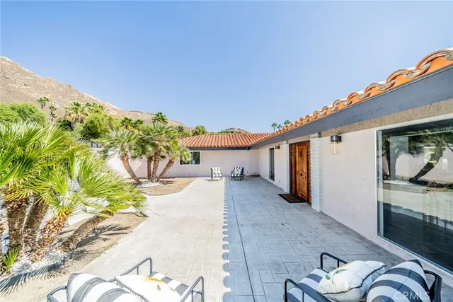 a view of a house with entertaining space