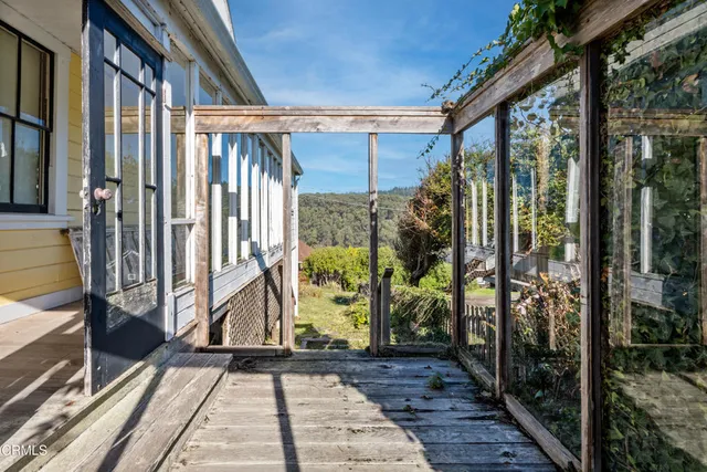a view of a house with a garden