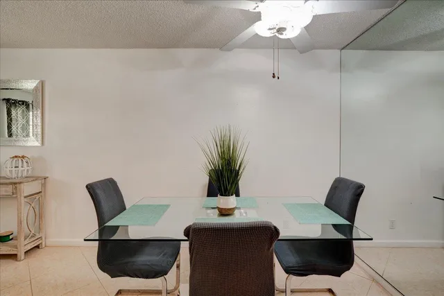 a kitchen with granite countertop a stove and a sink