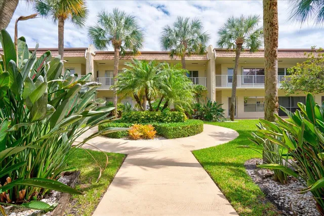 a view of yard with patio