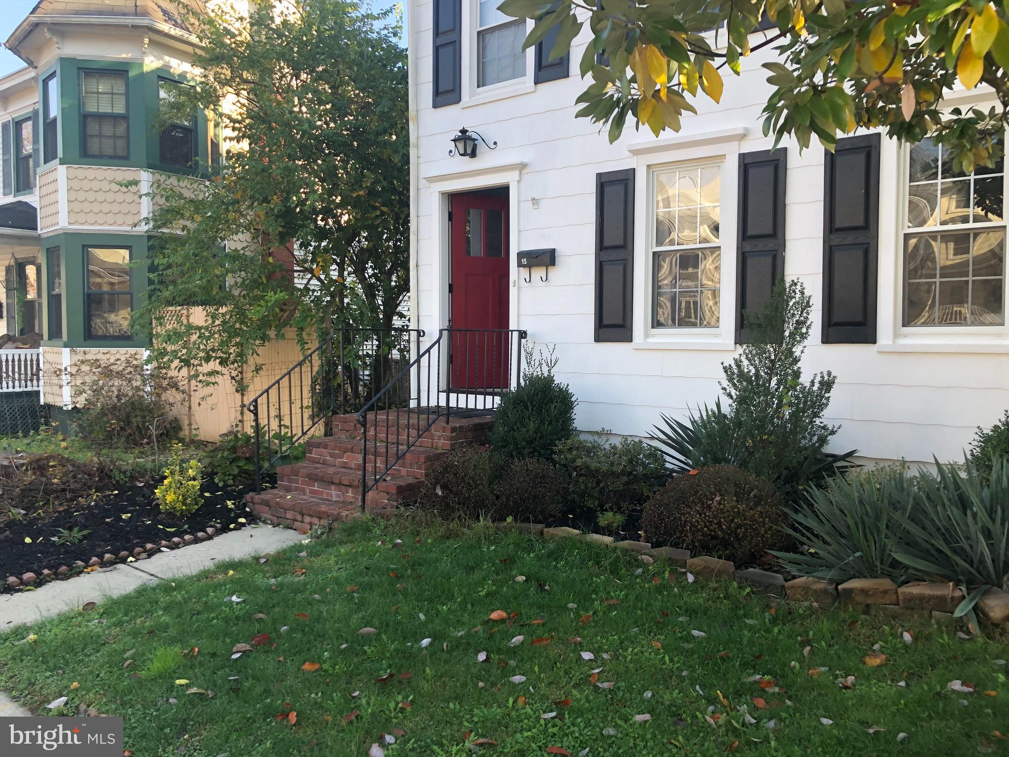 15 Chestnut Street Princeton, NJ 08542 - Photo 1 of 18 a view of a house with a small yard and plants