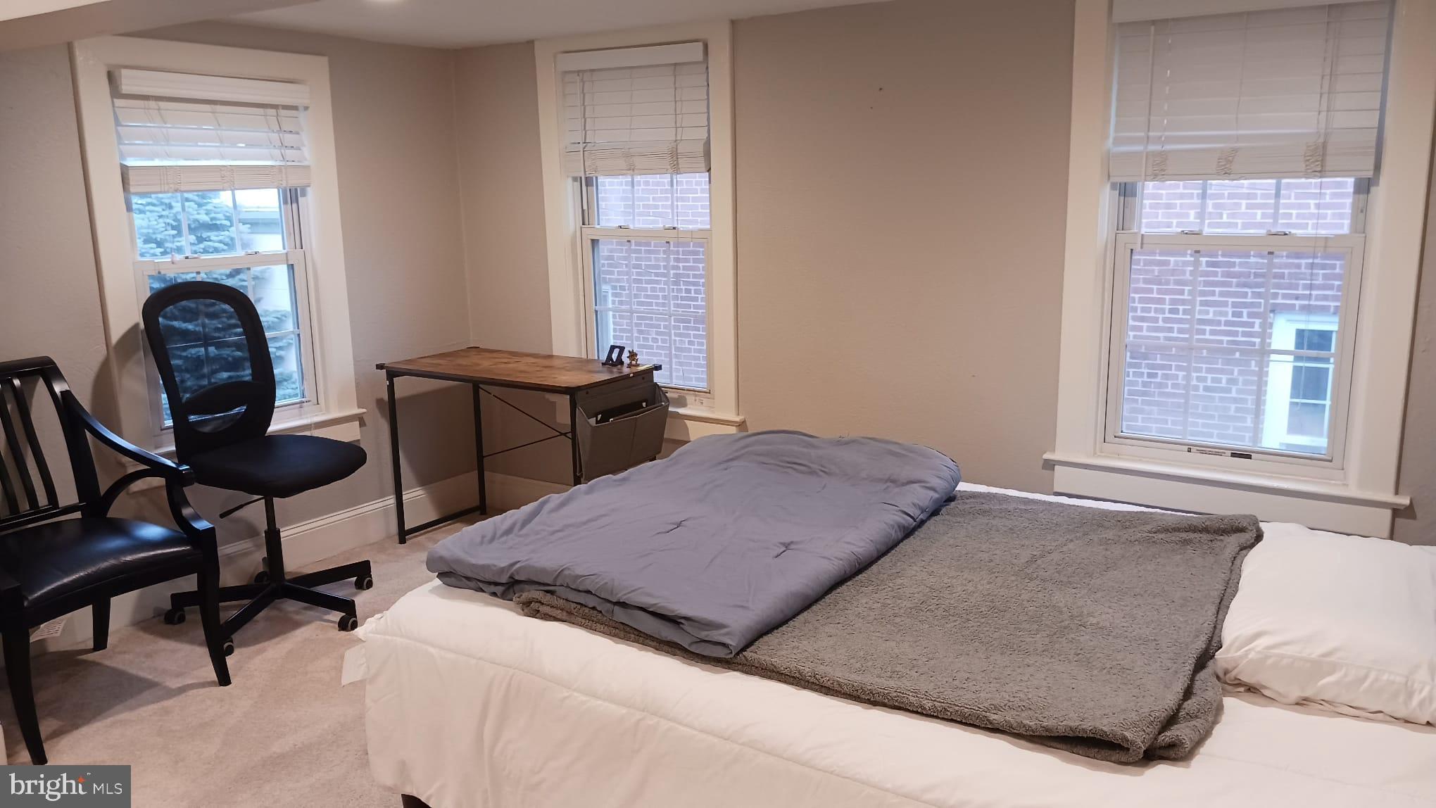 15 Chestnut Street Princeton, NJ 08542 - Photo 13 of 18 a living room with furniture and a window