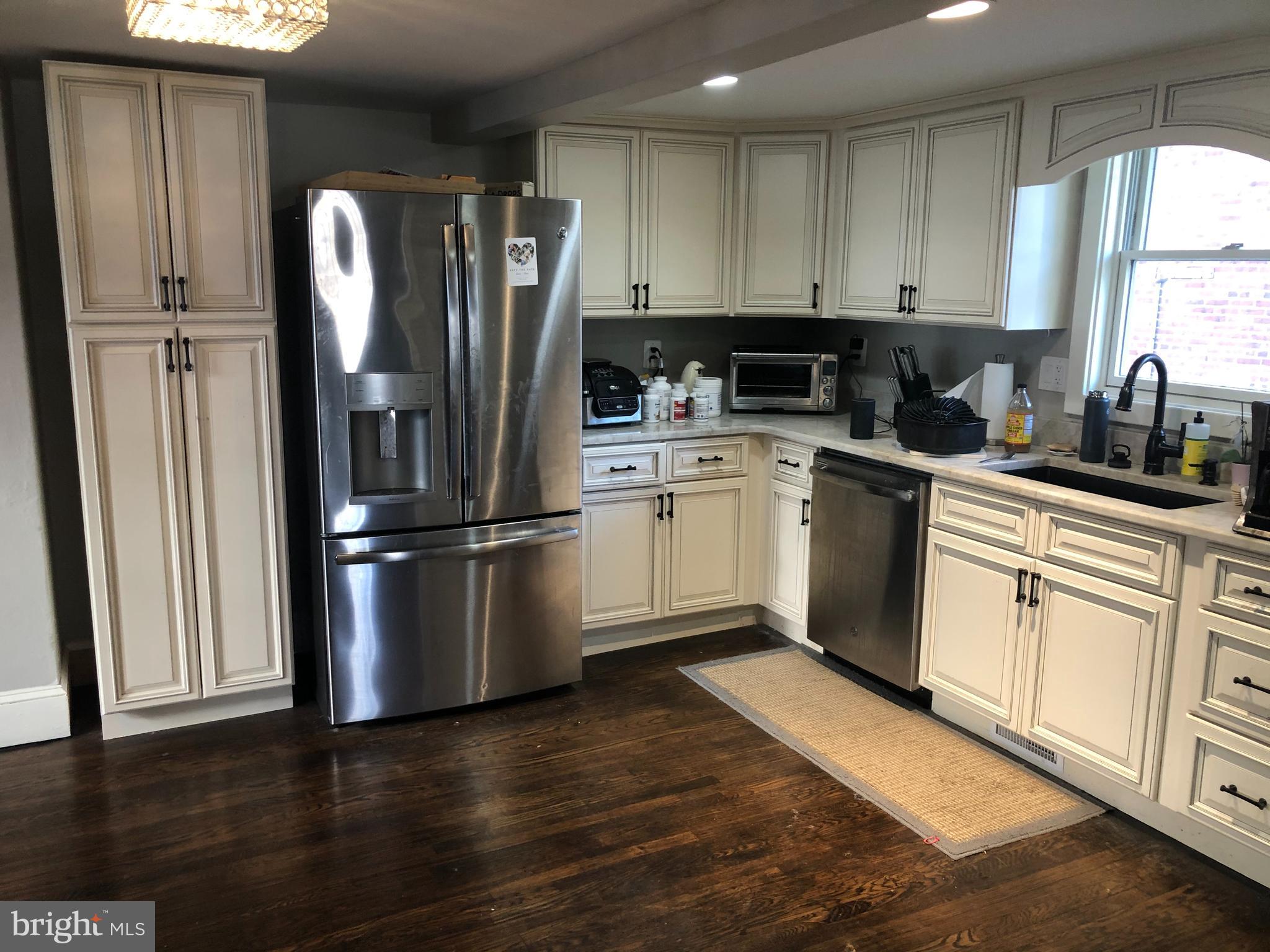 15 Chestnut Street Princeton, NJ 08542 - Photo 5 of 18 a kitchen with stainless steel appliances granite countertop a refrigerator sink and cabinets