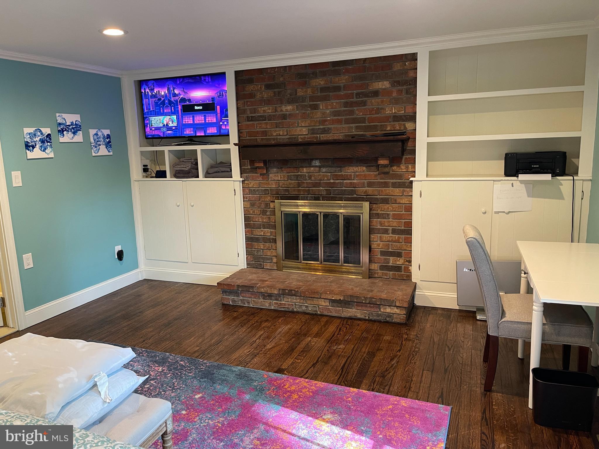 15 Chestnut Street Princeton, NJ 08542 - Photo 9 of 18 a living room with furniture a flat screen tv and a fireplace