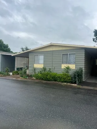 front view of a house with a street