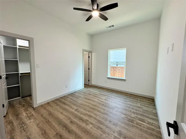 a hallway with closet