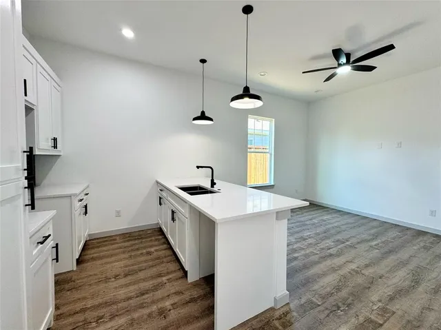 a room with an empty walk in closet