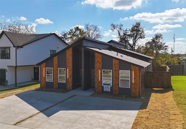 a kitchen with a refrigerator and a sink