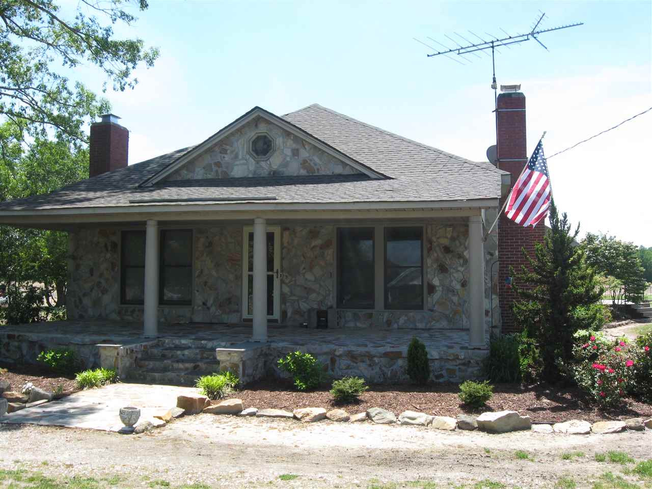 10796 Brogden Road Princeton, NC 27569 - Photo 2 of 25 32 foot long and 10.5 feet wide stone porch! porch