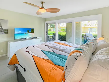 a bedroom with a bed and furniture