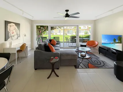 a living room with furniture and a window
