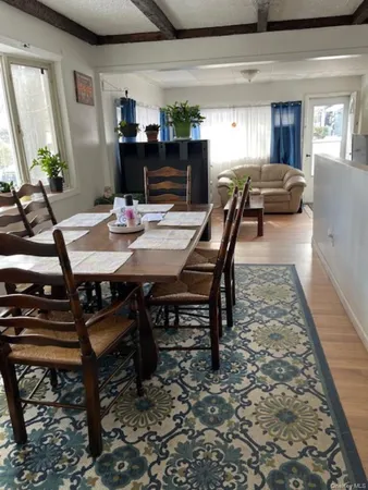 a view of a dining room with furniture