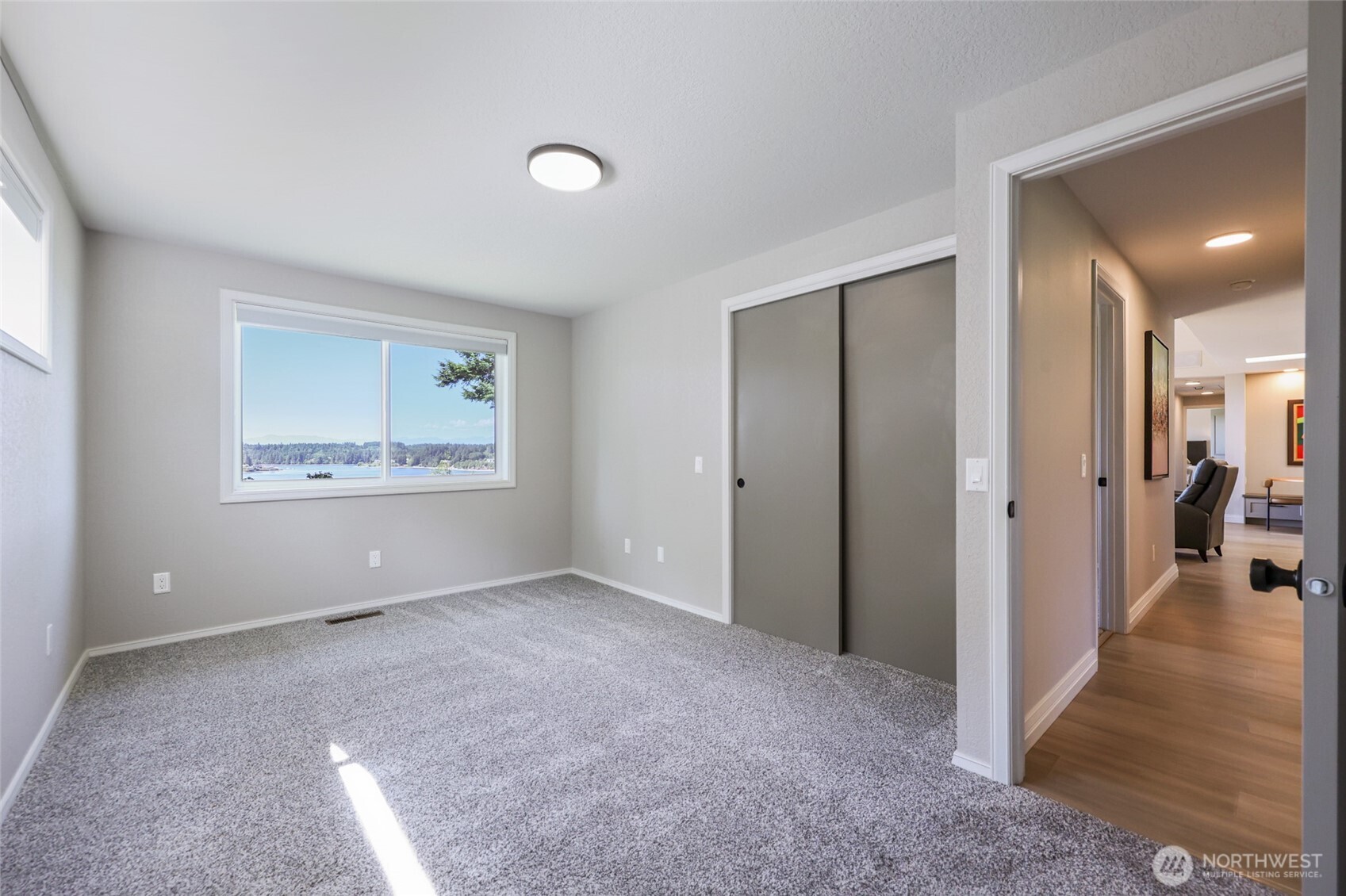 7713 78th Loop Northwest Olympia, WA 98502 - Photo 25 of 40 a view of an empty room with a window