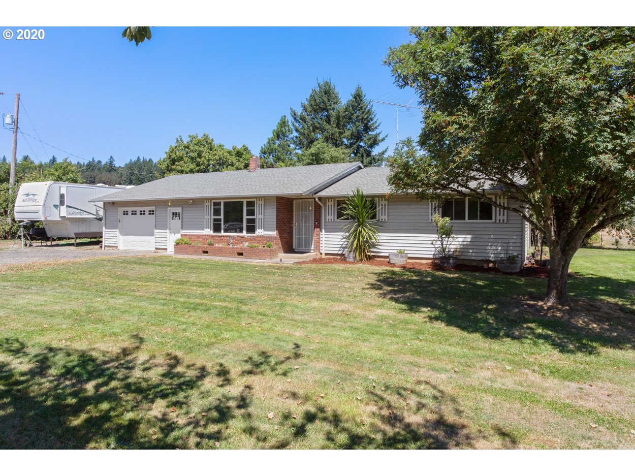 12655 Oak Road Northwest Salem, OR 97304 - Photo 23 of 24 a front view of a house with garden