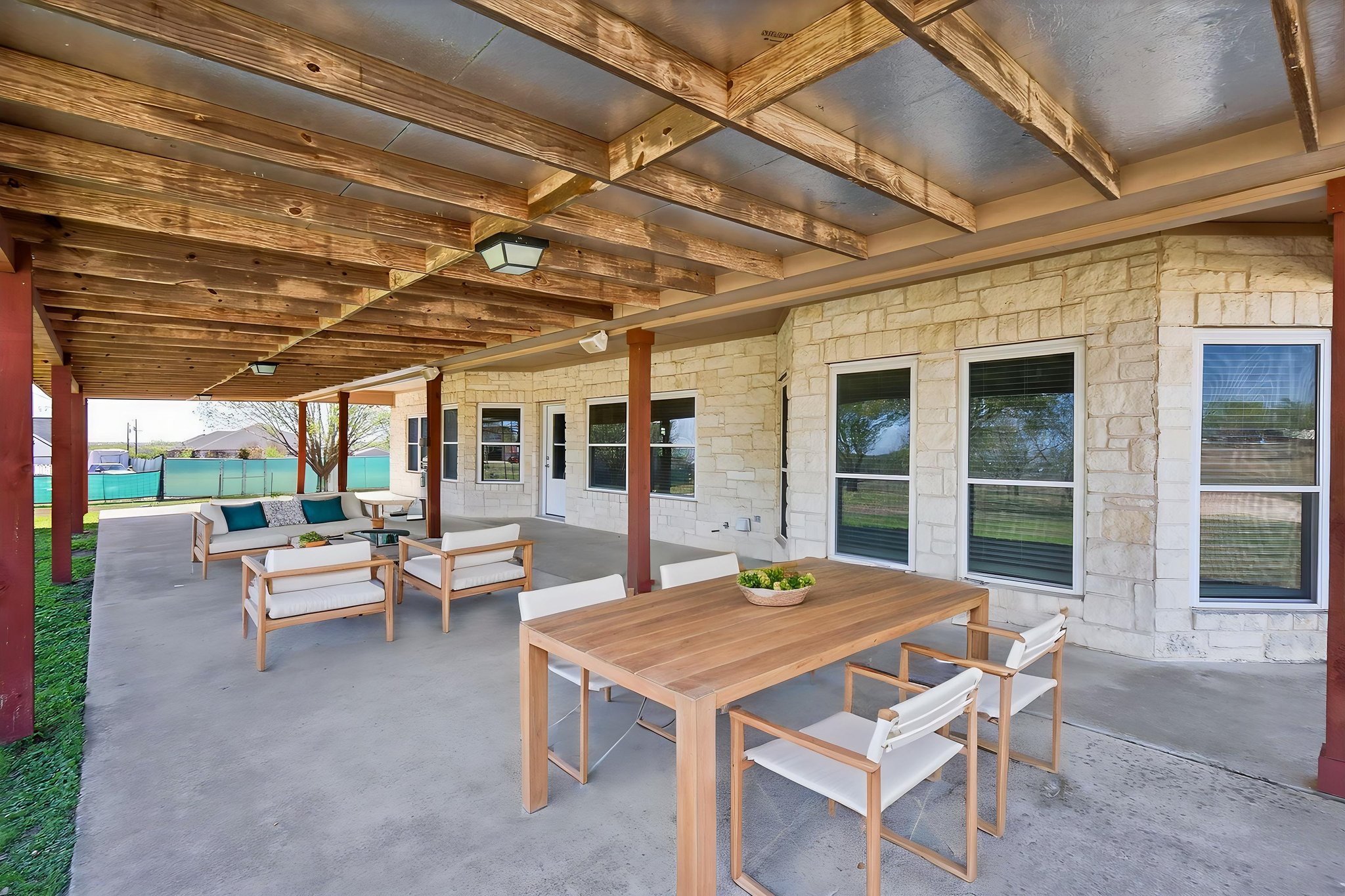 13639 Abrahamson Road Elgin, TX 78621 - Photo 20 of 30 View of patio with virtual staging, outdoor lounge area