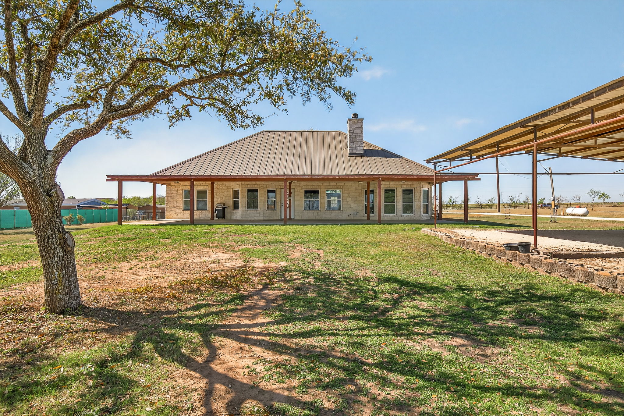 13639 Abrahamson Road Elgin, TX 78621 - Photo 22 of 30 With plenty of room for a garden