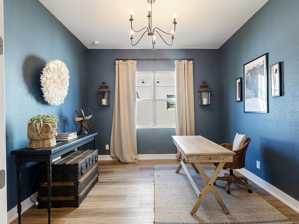 7857 Redonda Loop Lakewood Ranch, FL 34202 - Photo 19 of 51 a view of a workspace with furniture and a window