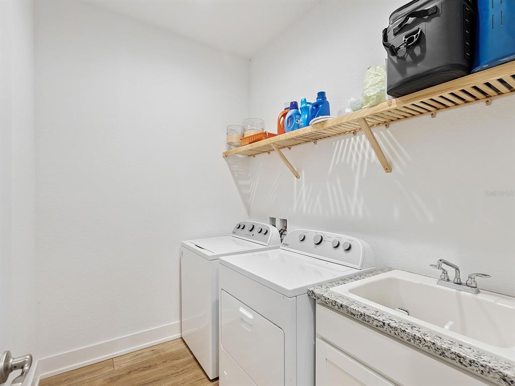 7857 Redonda Loop Lakewood Ranch, FL 34202 - Photo 29 of 51 a bathroom with a sink and a mirror