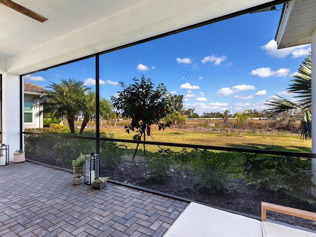7857 Redonda Loop Lakewood Ranch, FL 34202 - Photo 32 of 51 a view of a street with an outdoor space