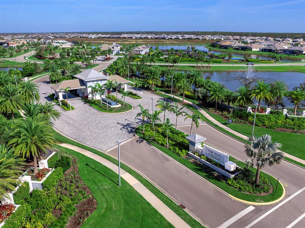 7857 Redonda Loop Lakewood Ranch, FL 34202 - Photo 34 of 51 an aerial view of a city and lake view
