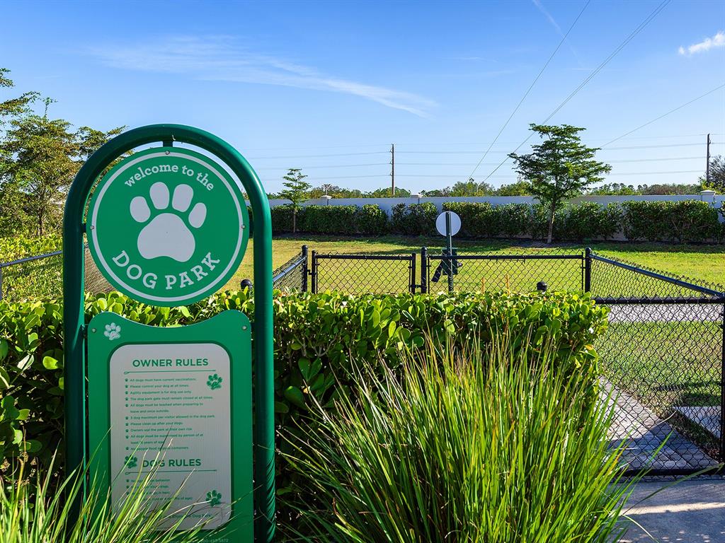 7857 Redonda Loop Lakewood Ranch, FL 34202 - Photo 42 of 51 a green field with lots of trees in the background