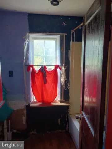 a view of a room with racks on the wall