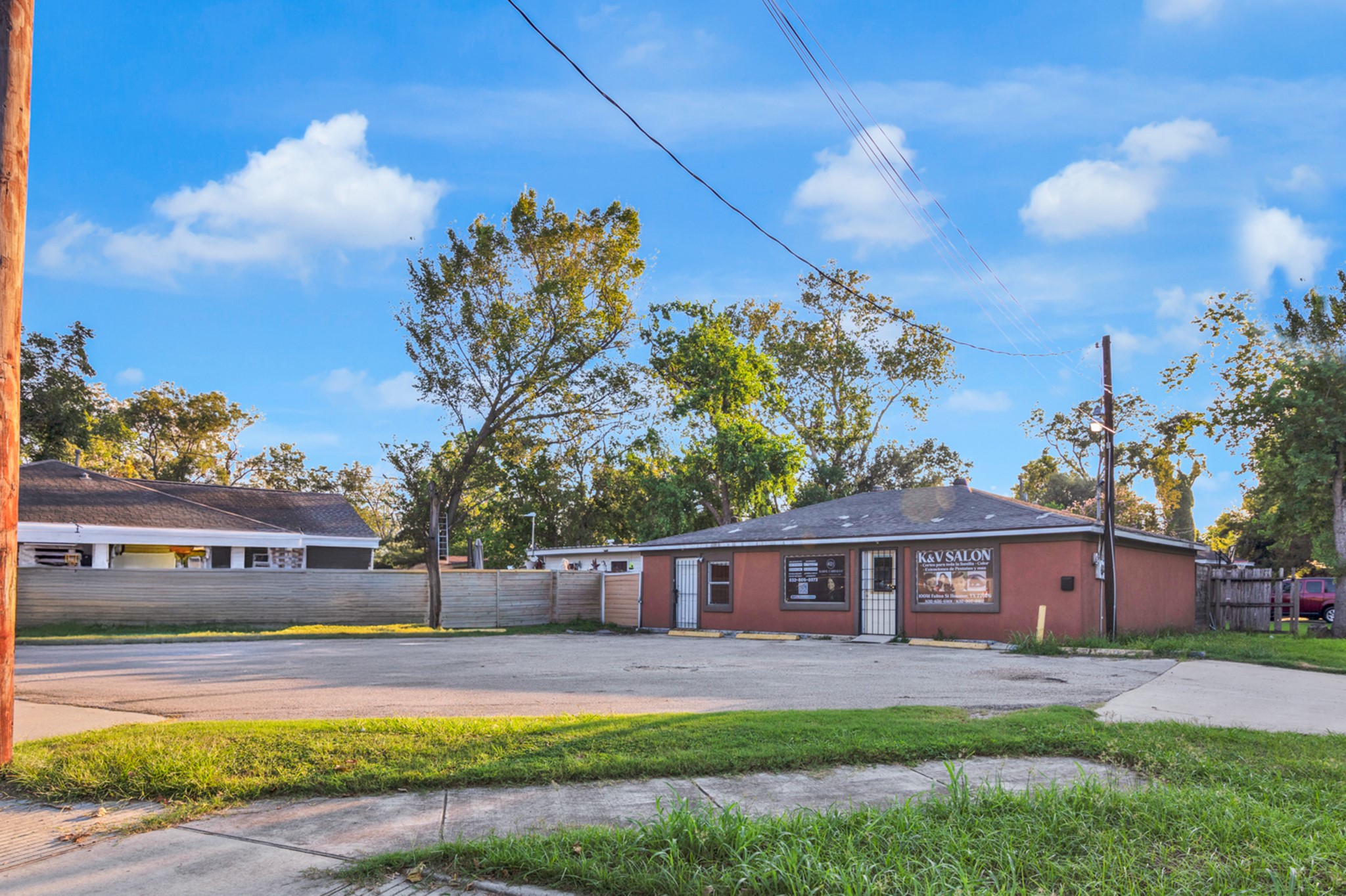 10041 Fulton Street Houston, TX 77076 - Photo 12 of 29 a front view of a house with garden