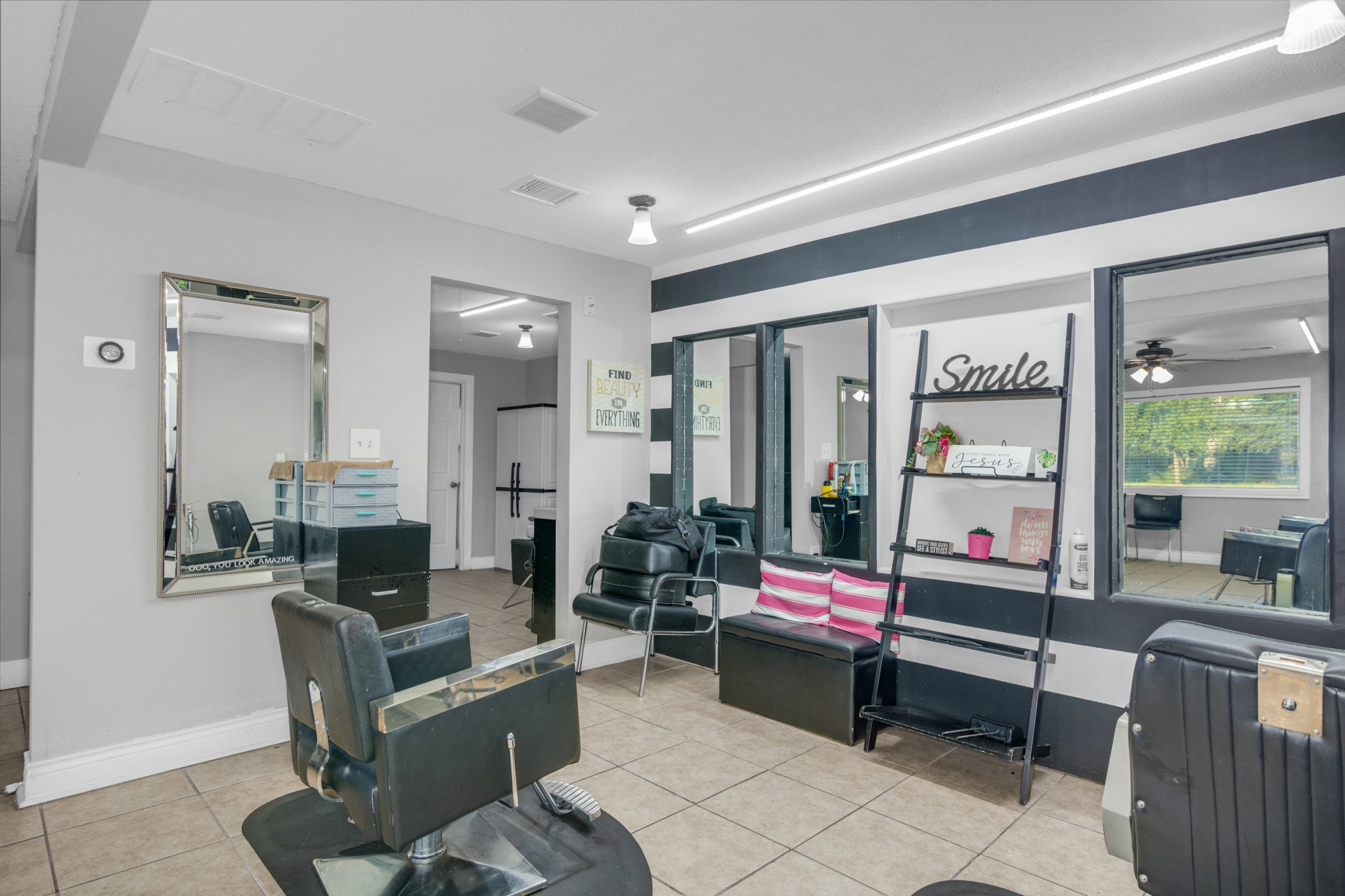 10041 Fulton Street Houston, TX 77076 - Photo 19 of 29 a living room with furniture and a large window