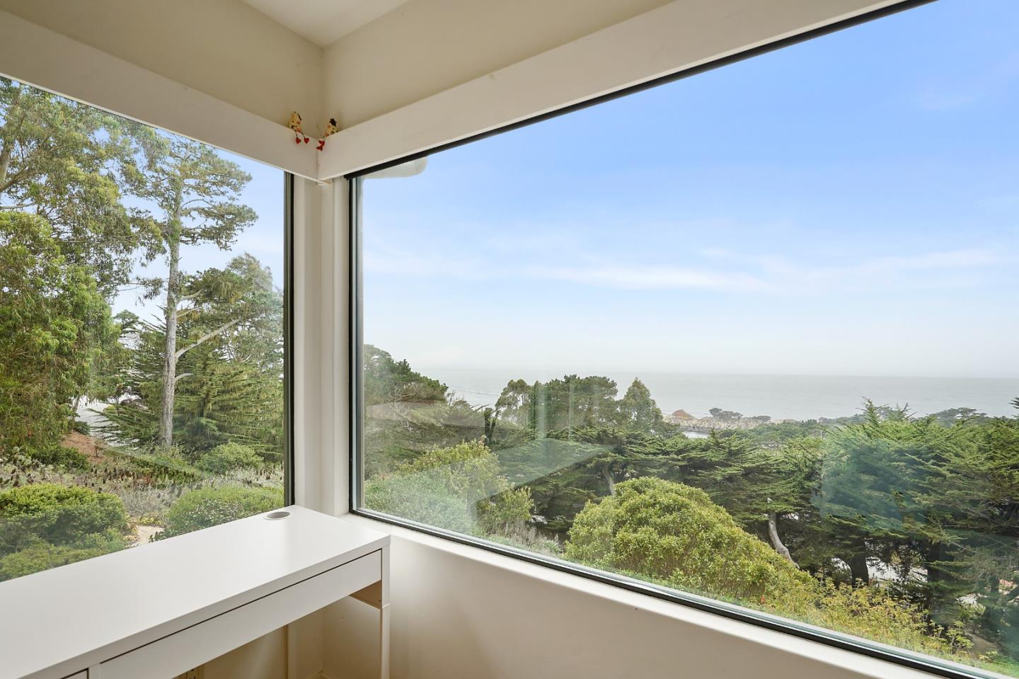 190 Upper Walden Road Carmel, CA 93923 - Photo 16 of 34 a view of a glass door and a balcony