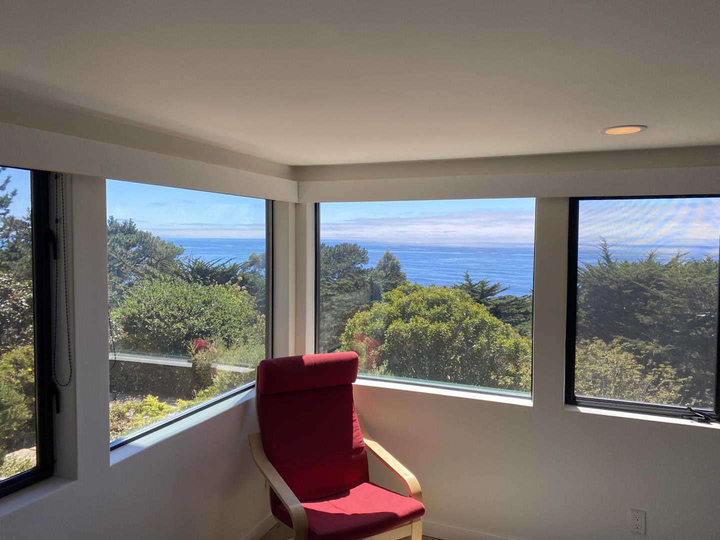 190 Upper Walden Road Carmel, CA 93923 - Photo 17 of 34 a room with furniture and a large window