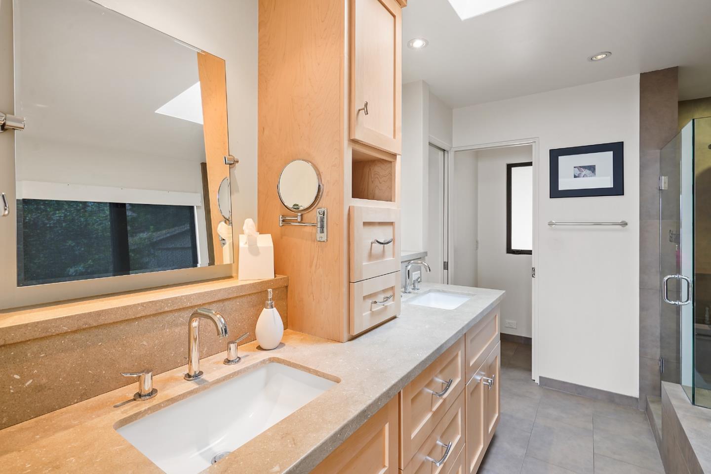 190 Upper Walden Road Carmel, CA 93923 - Photo 19 of 34 a bathroom with a sink double vanity and a mirror