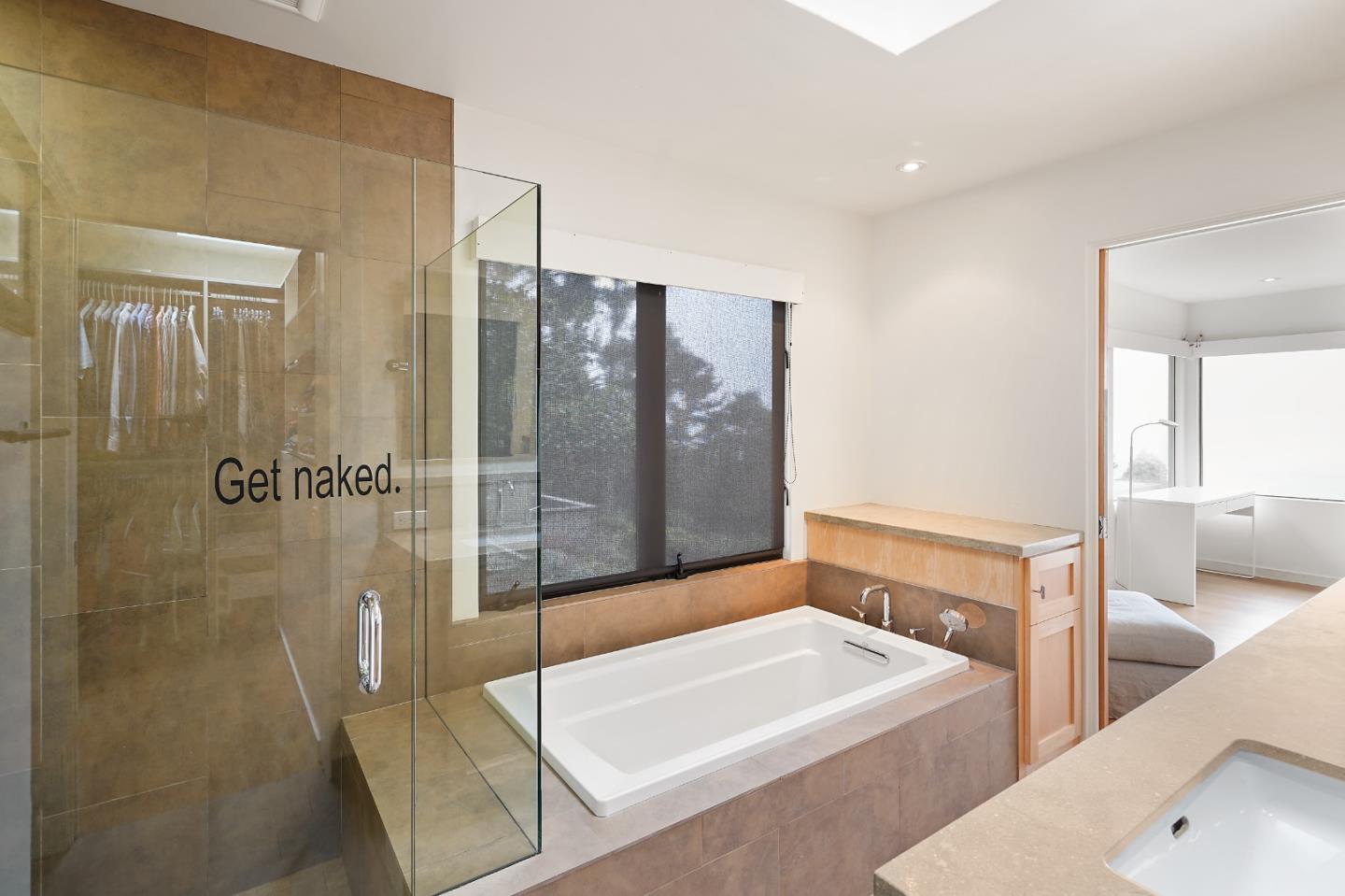 190 Upper Walden Road Carmel, CA 93923 - Photo 20 of 34 a bathroom with a tub a sink and a shower