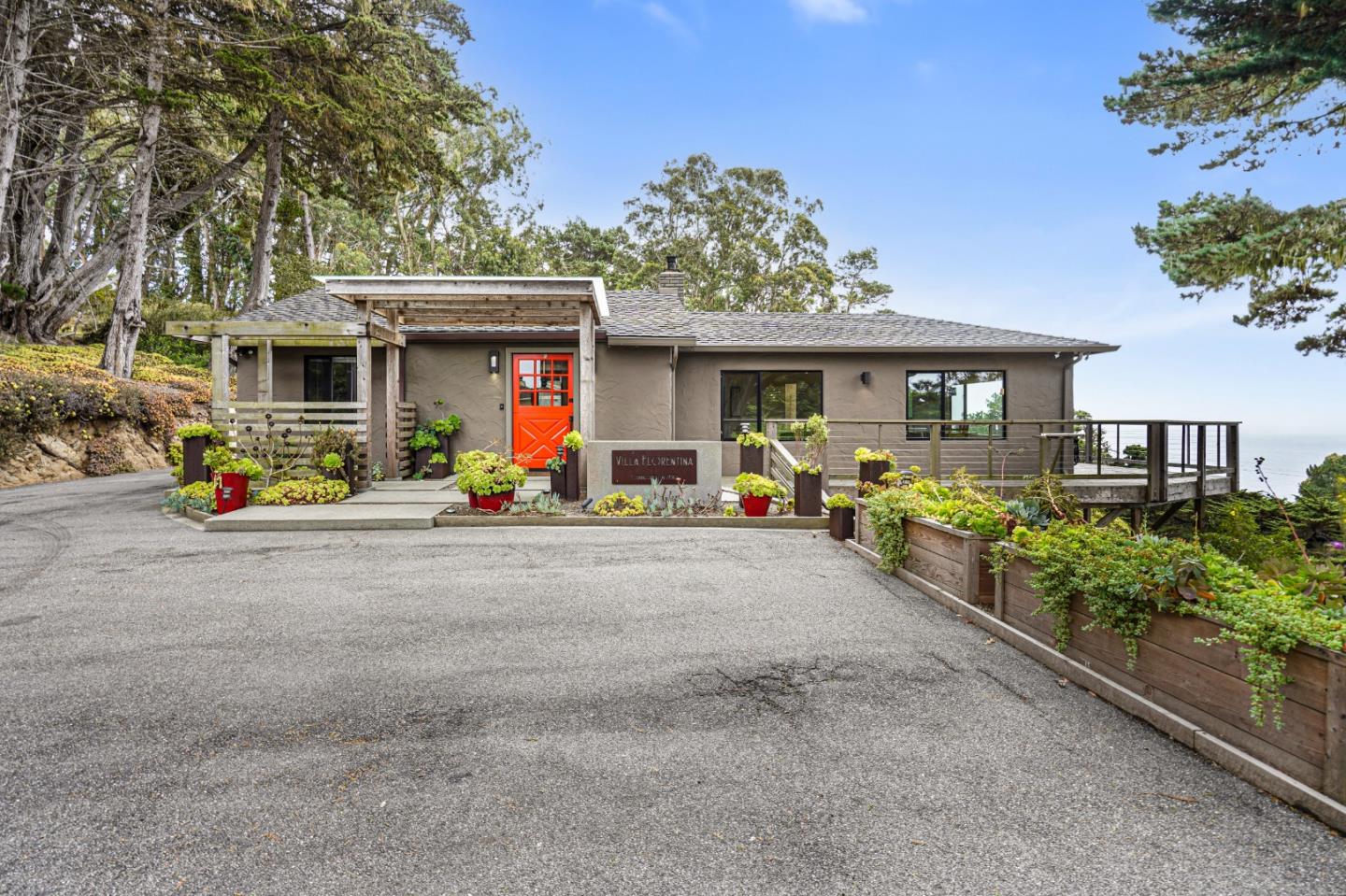 190 Upper Walden Road Carmel, CA 93923 - Photo 2 of 34 a front view of a house with an outdoor space