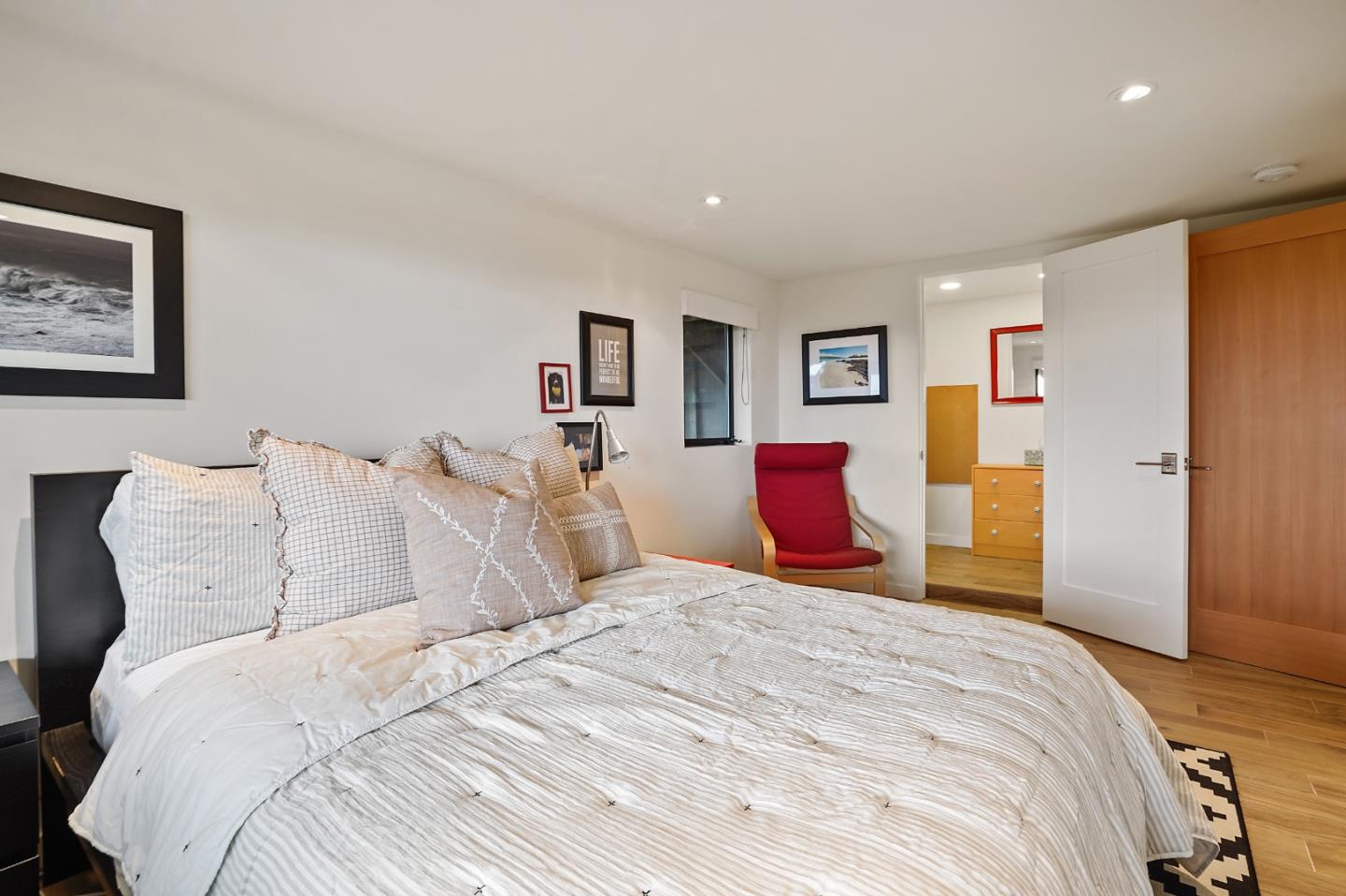 190 Upper Walden Road Carmel, CA 93923 - Photo 23 of 34 a bedroom with a bed and a closet