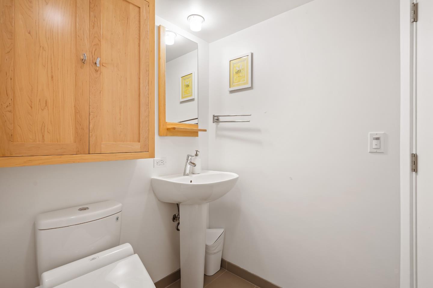 190 Upper Walden Road Carmel, CA 93923 - Photo 24 of 34 a bathroom with a sink a toilet and mirror
