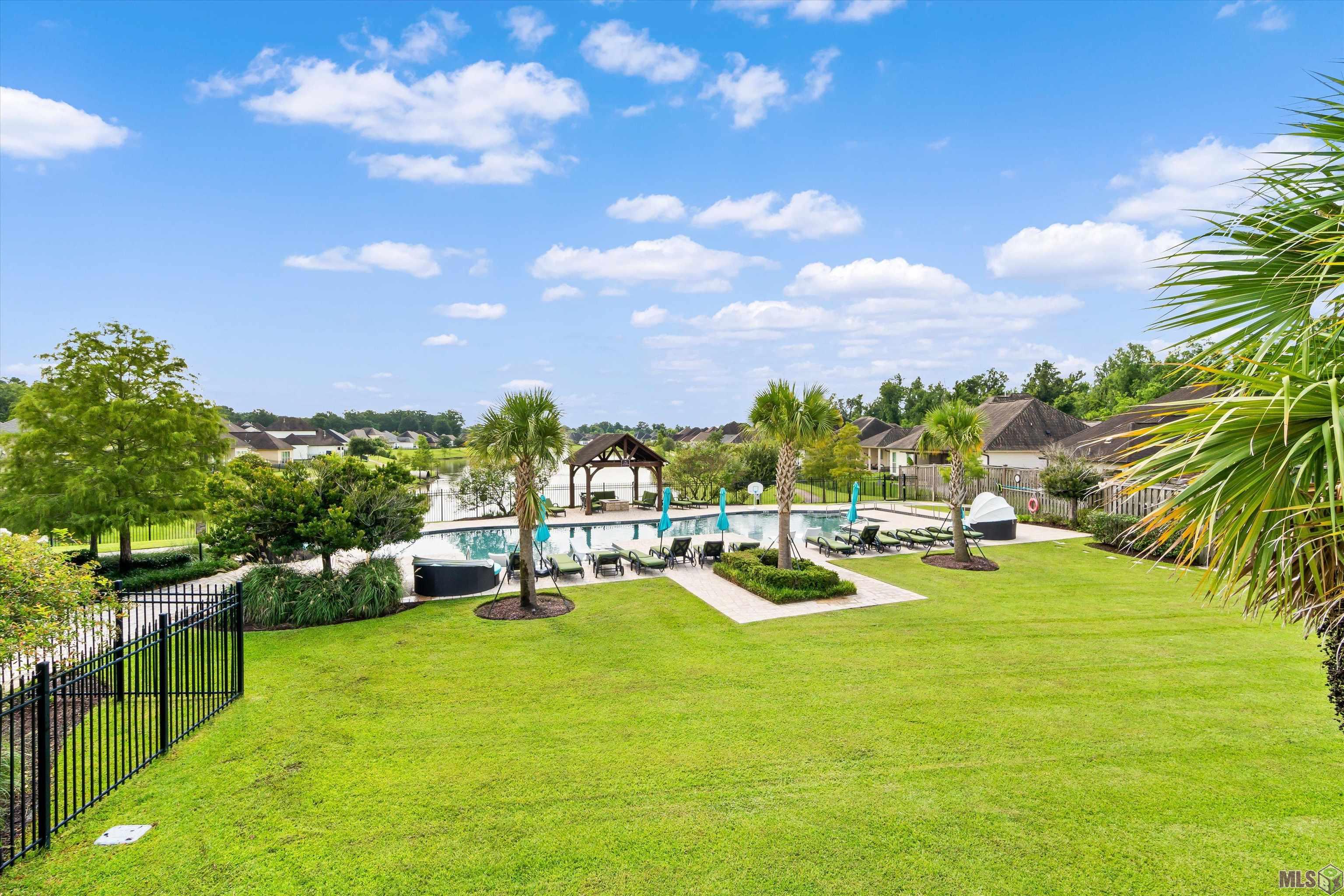 7703 Ibiza Drive Baton Rouge, LA 70820 - Photo 20 of 20 Community Pool over looking Lake