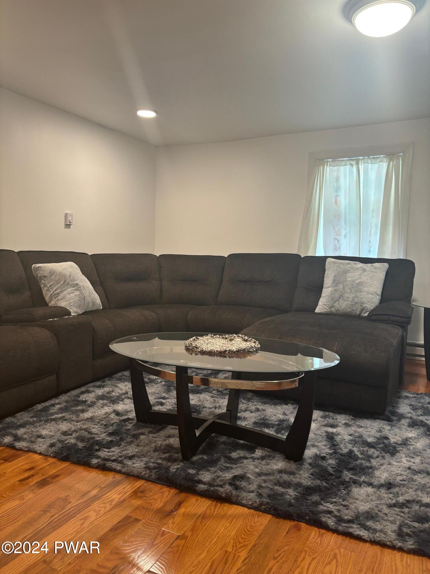 1113 Bracts Road Effort, PA 18330 - Photo 8 of 27 a living room with furniture and a rug