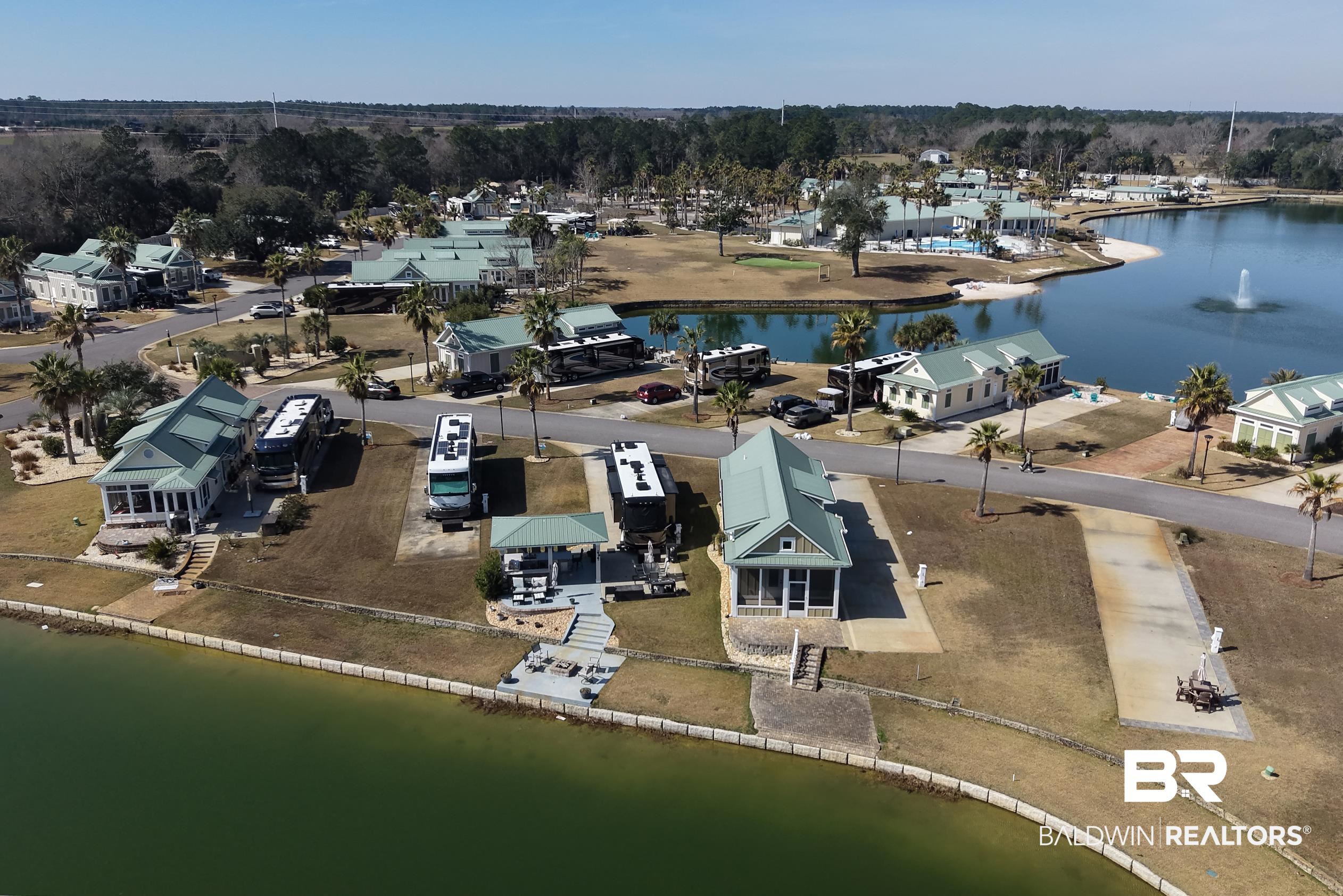 11986 Raptor Court Elberta, AL 36530 - Photo 9 of 28 Aerial perspective of suburban area with a nearby body of water