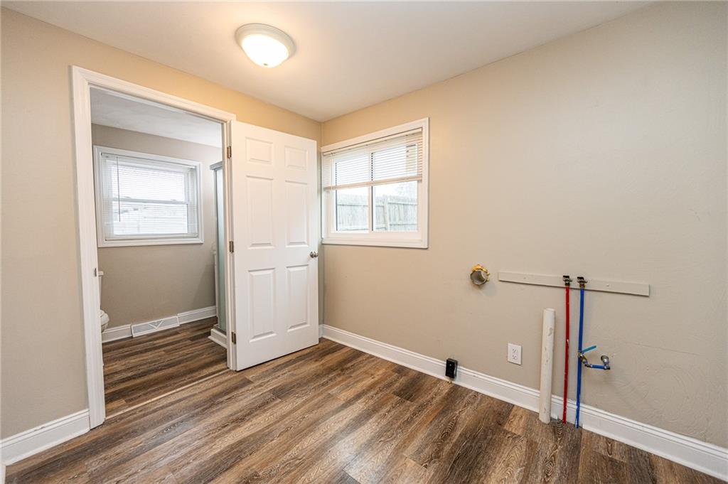 105 Washington Street Mount Pleasant, PA 15666 - Photo 15 of 29 a view of empty room with wooden floor