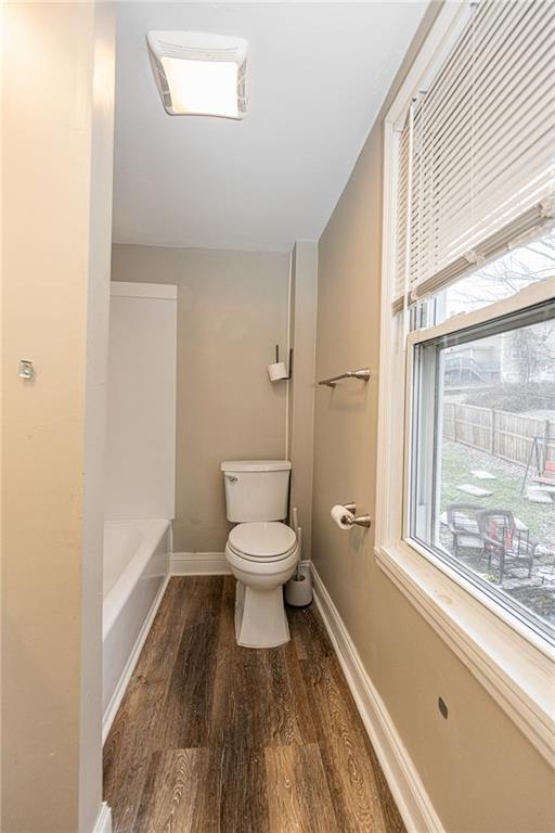 105 Washington Street Mount Pleasant, PA 15666 - Photo 20 of 29 a bathroom with a toilet and a shower