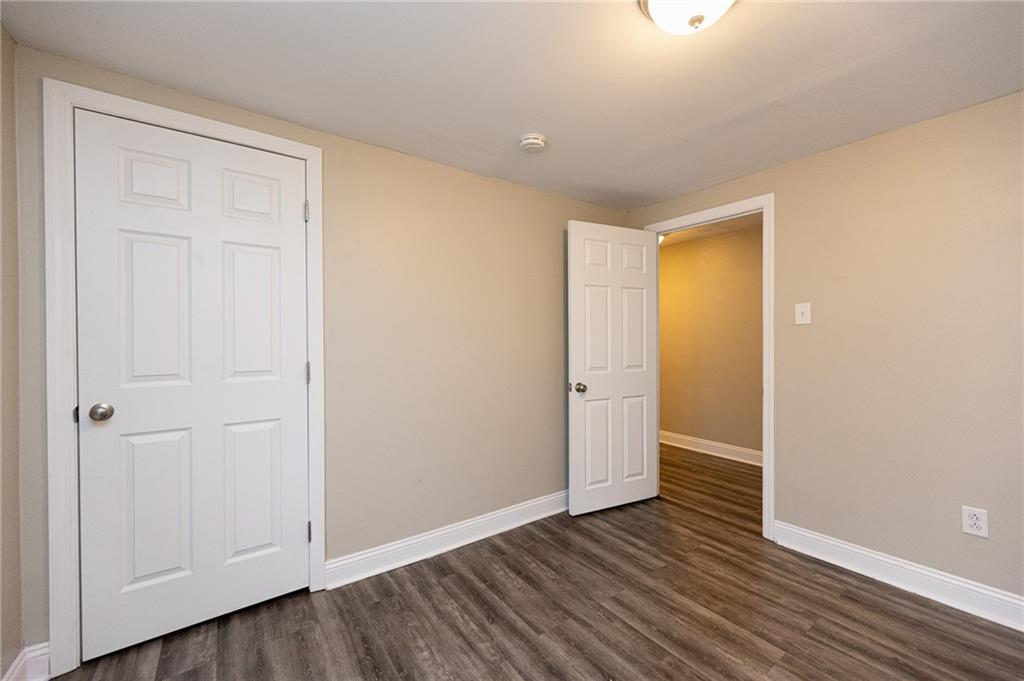 105 Washington Street Mount Pleasant, PA 15666 - Photo 26 of 29 wooden floor in an empty room