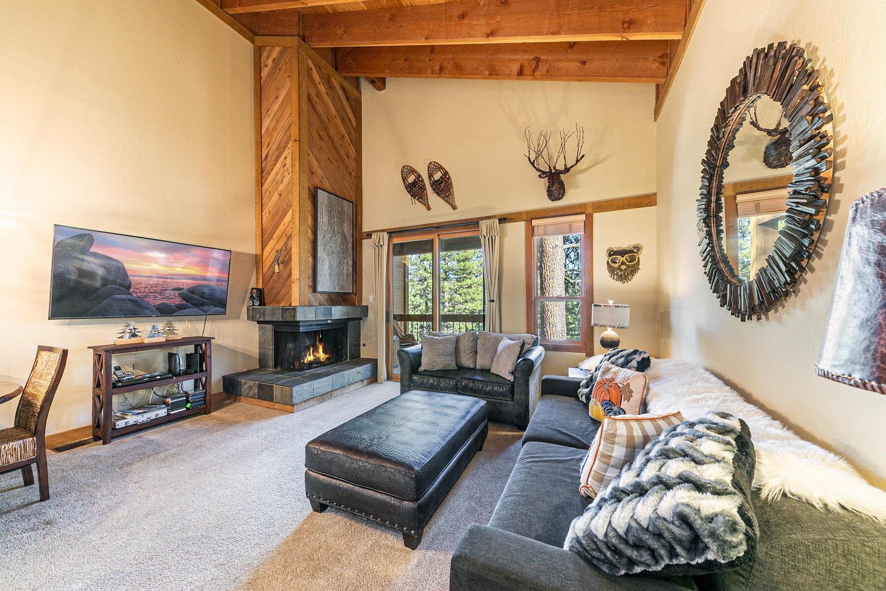 5105 Gold Bend Truckee, CA 96161 - Photo 1 of 27 a living room with furniture and a flat screen tv